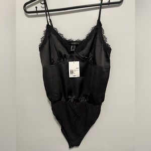 Forever 21 women’s bodysuit, Size L, Black NWT.